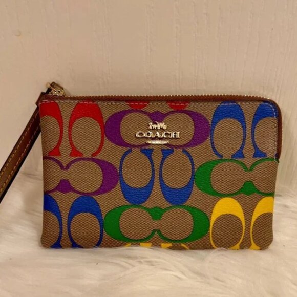Coach Handbags - Coach Corner Zip Wristlet In Rainbow Signature Canvas "Special Edition"